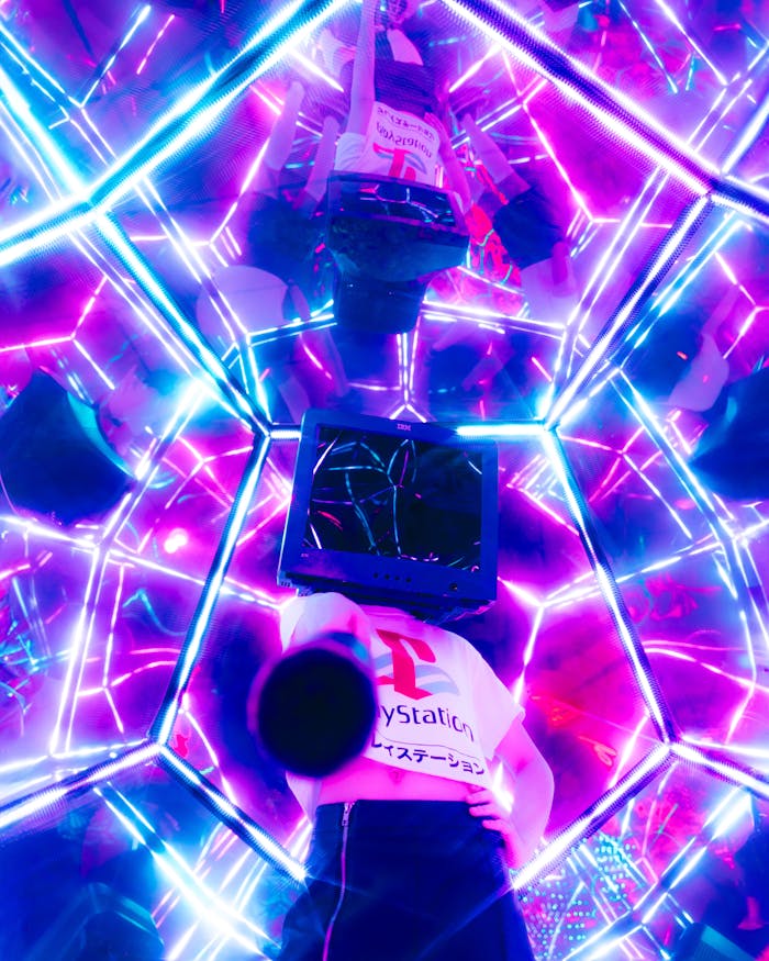 A surreal scene featuring a person with a TV as a head, surrounded by neon lights.